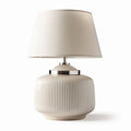 Ceramic table lamp with textured base and fabric shade 25 x 25 x 40cm