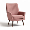 Upholstered pink accent chair with mid-century modern design and wooden legs